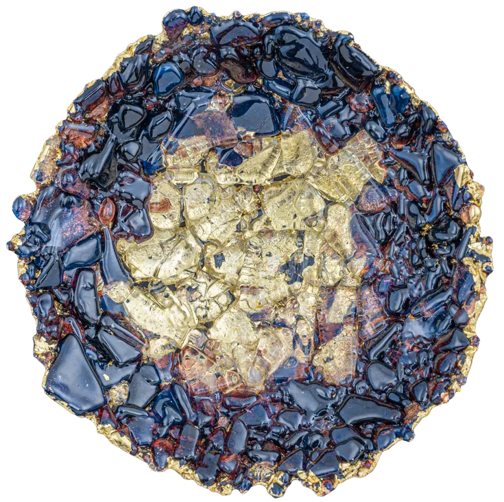 Round fused glass piece with blue and amber glass clusters